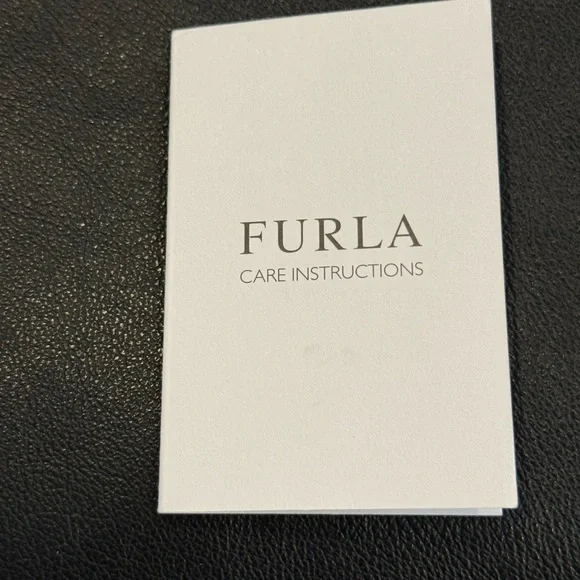 Furla Leather Black and White Clutch with removable crossbody/shoulder strap - Picture 8 of 12